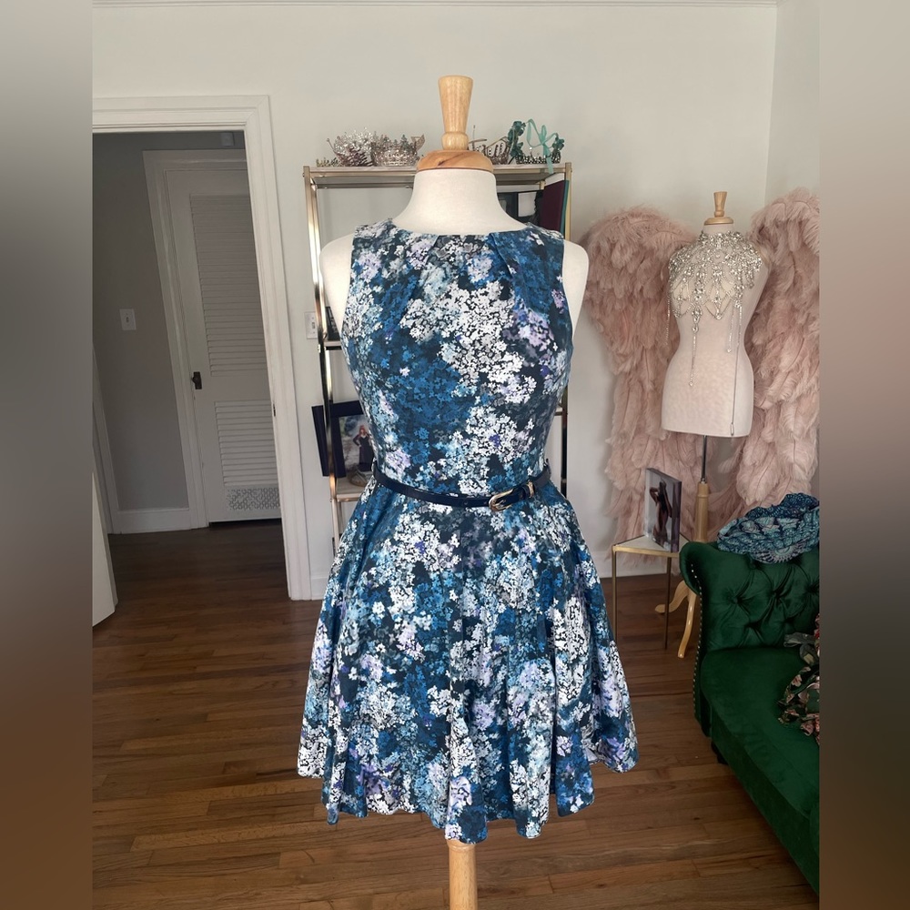 Cute professional dress knee length with blue flowers and skinny blue belt